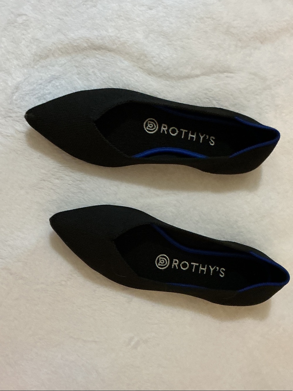 Rothy's Black Pointed-Toe Flats with Blue Trim Accent
